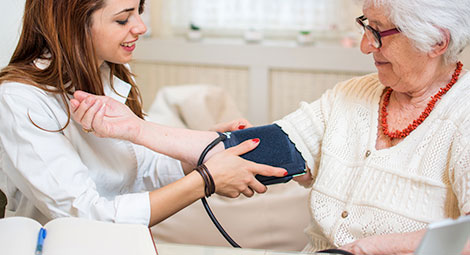 Doctor visiting patient at home